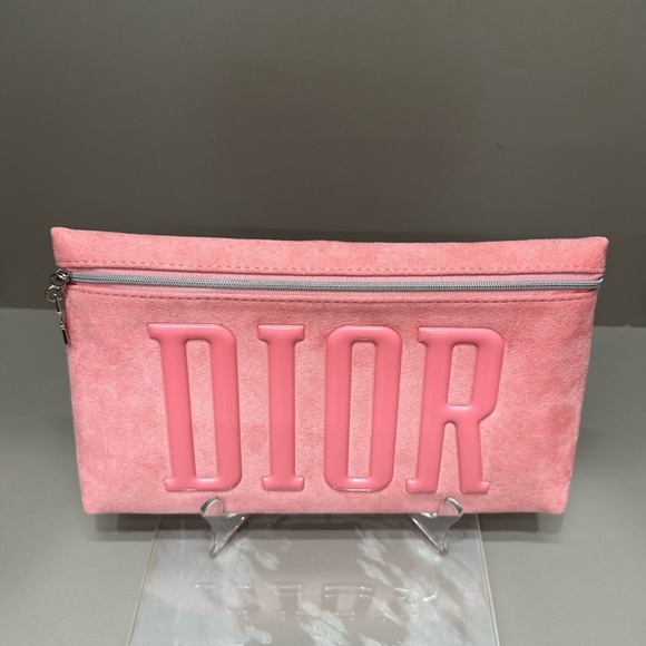 DIOR LARGE PINK 3D LOGO
CLUTCH "DIOR" IN SUEDE AND IN PINK. NWOT RARE - Picture 1 of 8